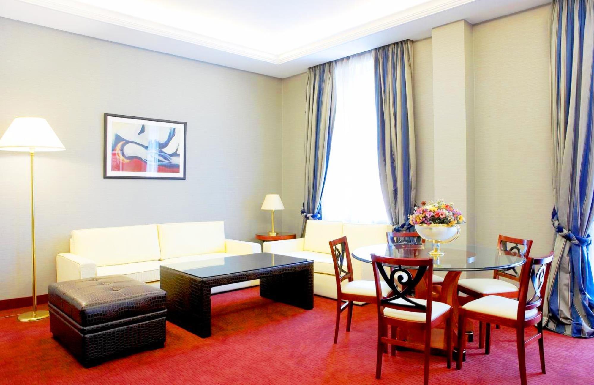 Piraeus Theoxenia Hotel Exterior photo A suite at the Hotel Astoria