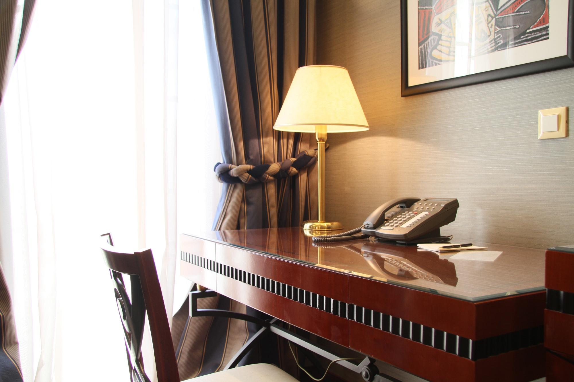 Piraeus Theoxenia Hotel Exterior photo A desk with a telephone