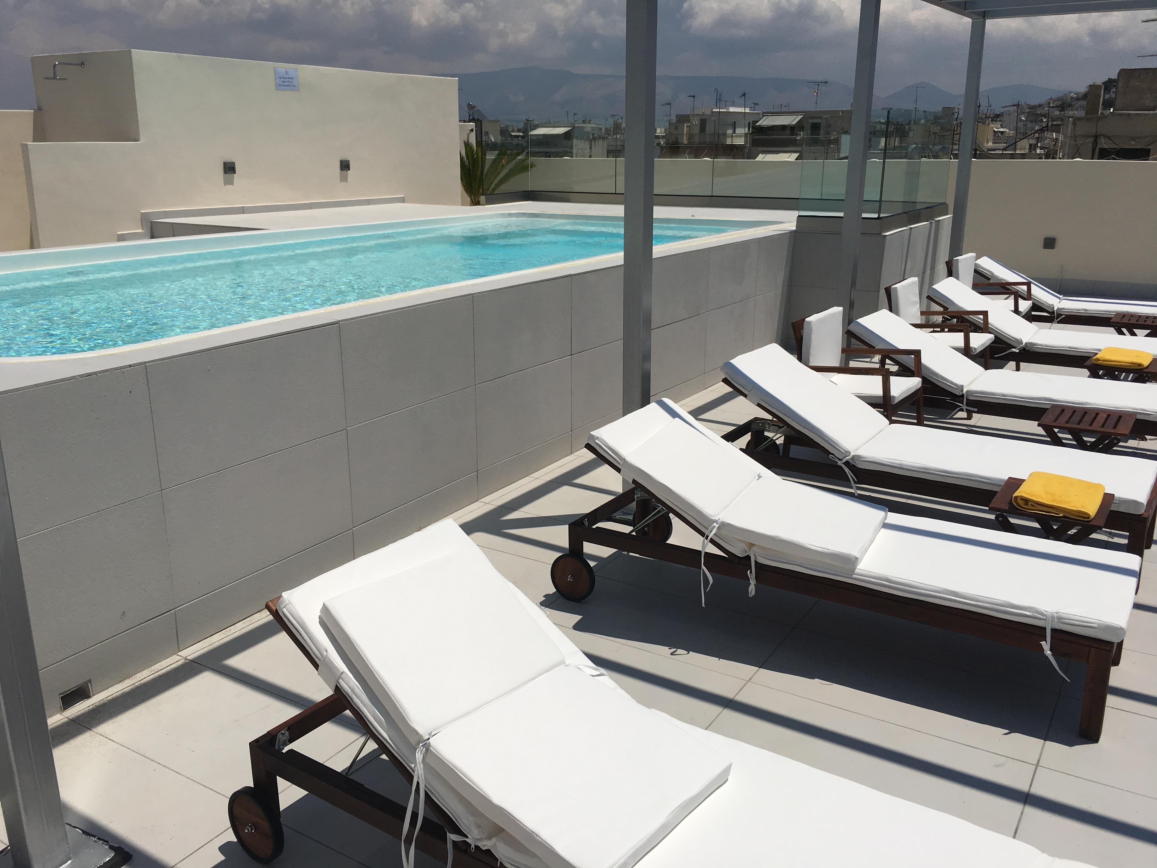 Piraeus Theoxenia Hotel Exterior photo Rooftop pool at the hotel