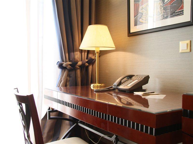 Piraeus Theoxenia Hotel Exterior photo A desk with a telephone