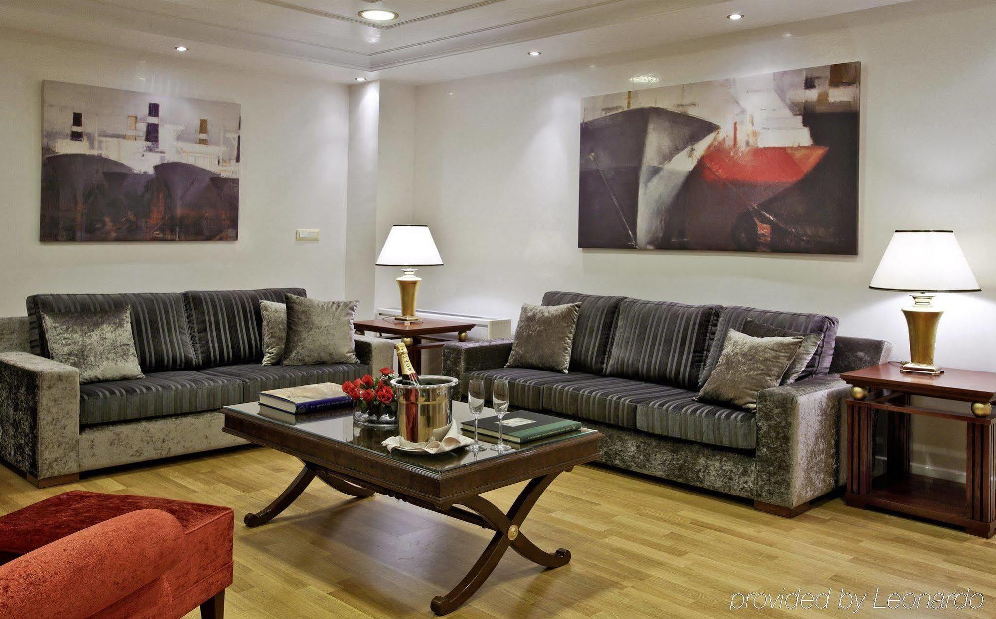 Piraeus Theoxenia Hotel Exterior photo A living room