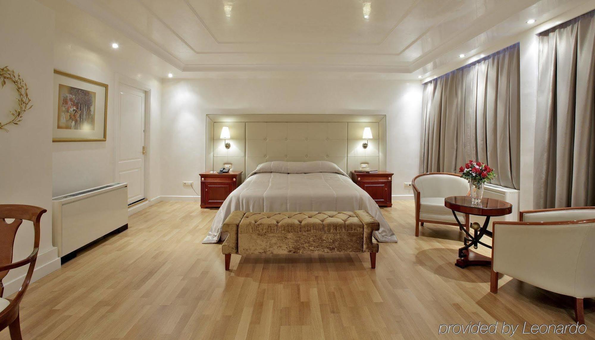Piraeus Theoxenia Hotel Exterior photo A bedroom at the hotel